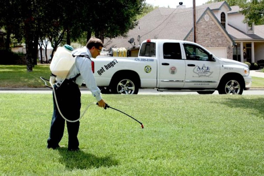 ACI truck set up with spray tanks for lawn work